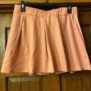 Soft and stretchy peach mini skort NWOT!